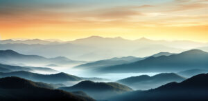 Stunning sunset view landscape with layers of valeys and mountains that become less visible with the distance, mystic fog, green tones and orange tones