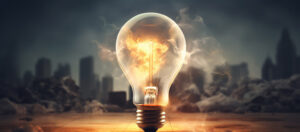 A very hot light bulb in a dark background and a far city view representing the concept of a brilliant idea